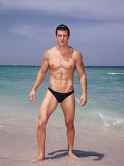 Sexy Zack Johnathan shows off his body on the beach