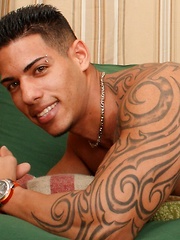 Hot latino macho shows his strong body and strokes hard dick