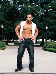Victor Lucca poses outdoors and in a bed