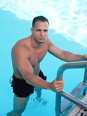 Victor Lucca poses outdoors and in a bed