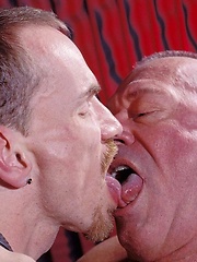 Chad Adams fists and bareback fucks this chubby dads juicy bunghole