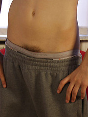 Sporty teen boy getting rid of his baggy clothes