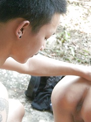 Hot fuck scene between these 2 gorgeous Asian boys in the outdoors