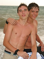 Cute sexy twinks naked by the sea