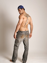 Sexy latino stallion sits on chair and jerks his tool