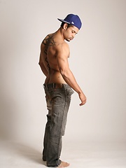 Sexy latino stallion sits on chair and jerks his tool