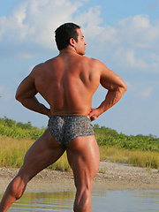 Handsome muscle man showing his smooth bubble butt