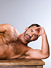 Hairy muscle man posing