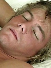 Sexy white-haired jock stroking dick