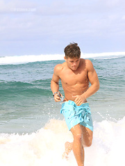 Sexy beach jock playing outdoors and in a room