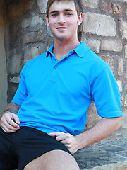 Strong blue-eyed straight jock solo posing
