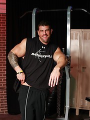 Hot solo body builder Zeb Atlas does a slow striptease and lets his gorgeous cock hang out