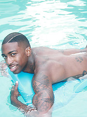 Rob takes a plunge at the swimming pool bare naked and unleashes his big black cock
