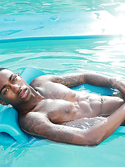 Rob takes a plunge at the swimming pool bare naked and unleashes his big black cock