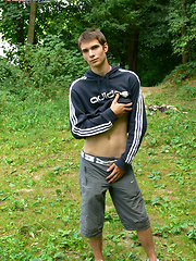Cute gay boy strips outdoors and plays with his sexy cock as it gets nice and hard