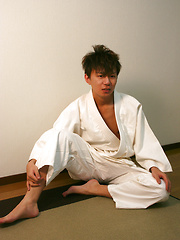 Sliding into his partner, Yura holds up Toraemons legs as the two begin