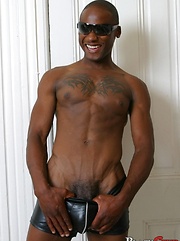 Black stud with tattoed chest