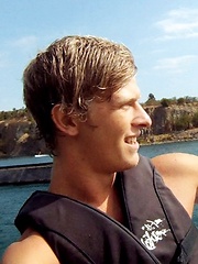 Jack Harrer being tag teamed by Alex Waters and Austin Merrick