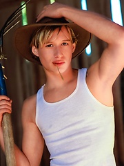 Village boy shows off his figure