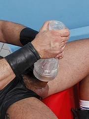 Covering his buff, hairy hunky body in leather, kinky muscle man Bruno Fox shows us exactly how it's done
