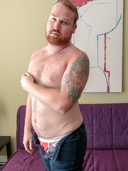 Solo redheaded bear jerks off and cums on his thick stomach