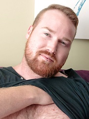 Solo redheaded bear jerks off and cums on his thick stomach